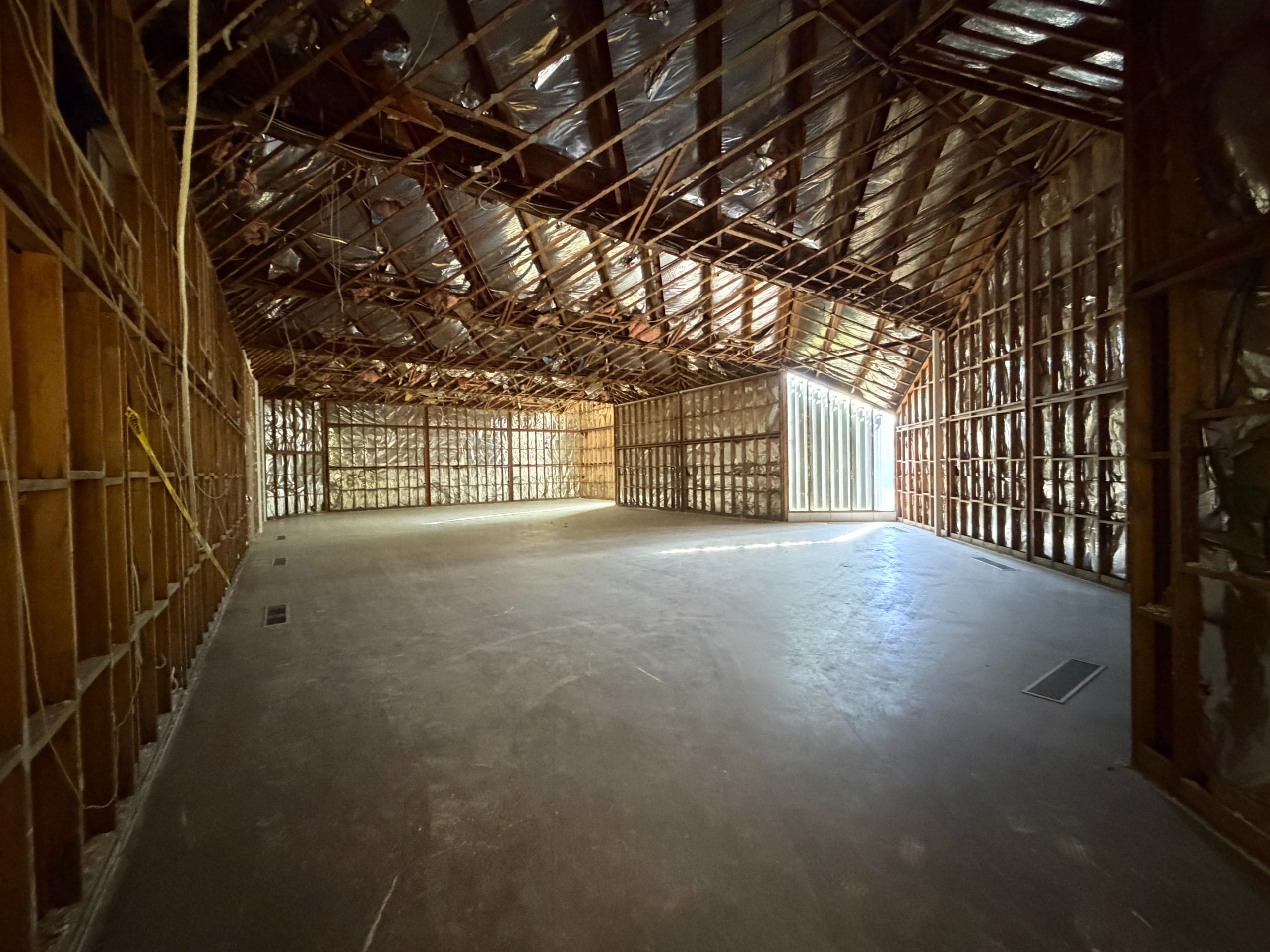 Interior of gallery with bare frame exposed